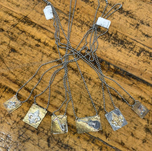 Large brass/Sterling pendant stainless steel by Molly Henderson