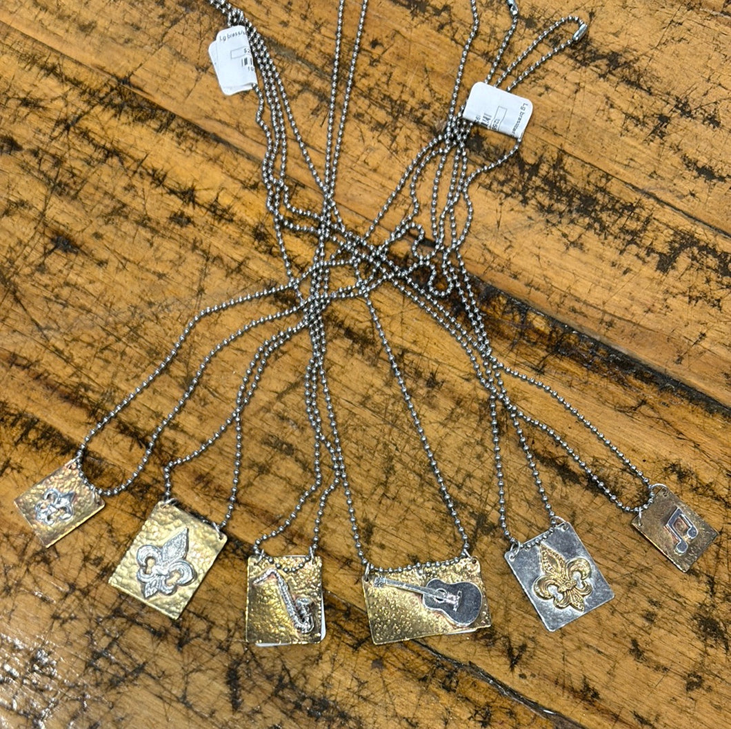 Large brass/Sterling pendant stainless steel by Molly Henderson